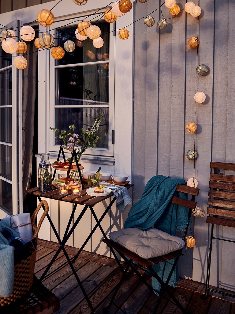 TÄRNÖ Chair, outdoor - foldable black/light brown stained